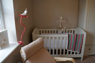 Baby monitor over child's crib