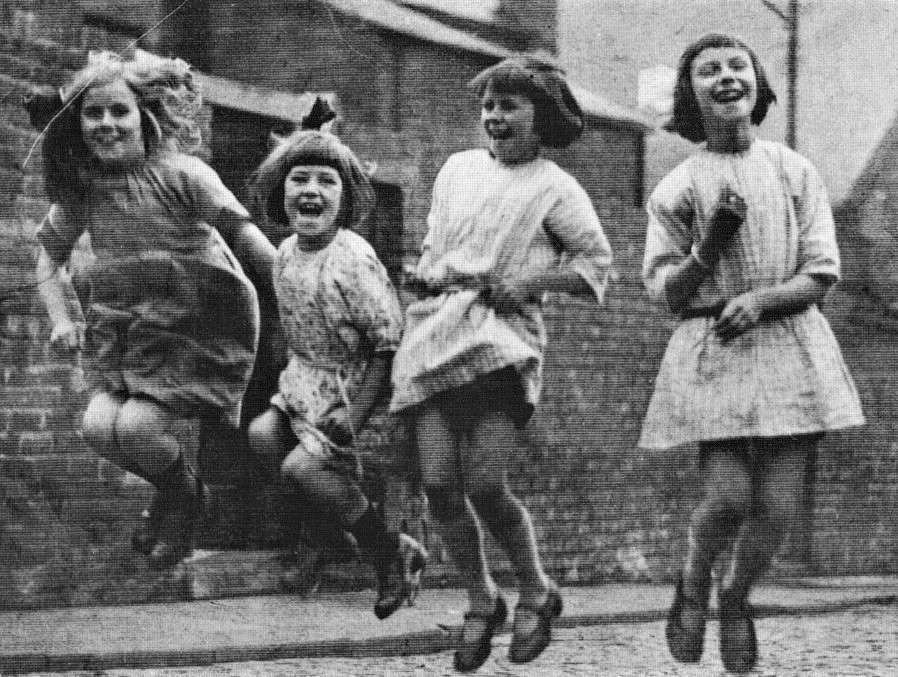 Little girls jumping rope