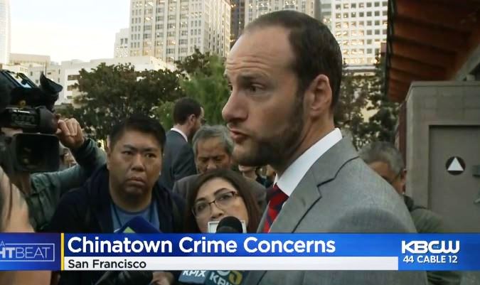 Chesa Boudin speaking to reporters