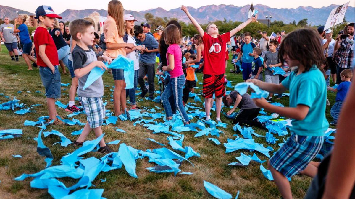 children tearing up covid masks